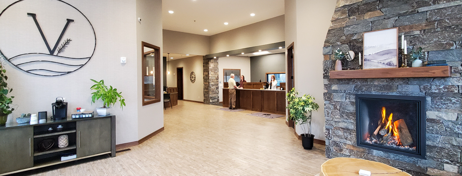 Lobby of Alexandria office with people at the counter